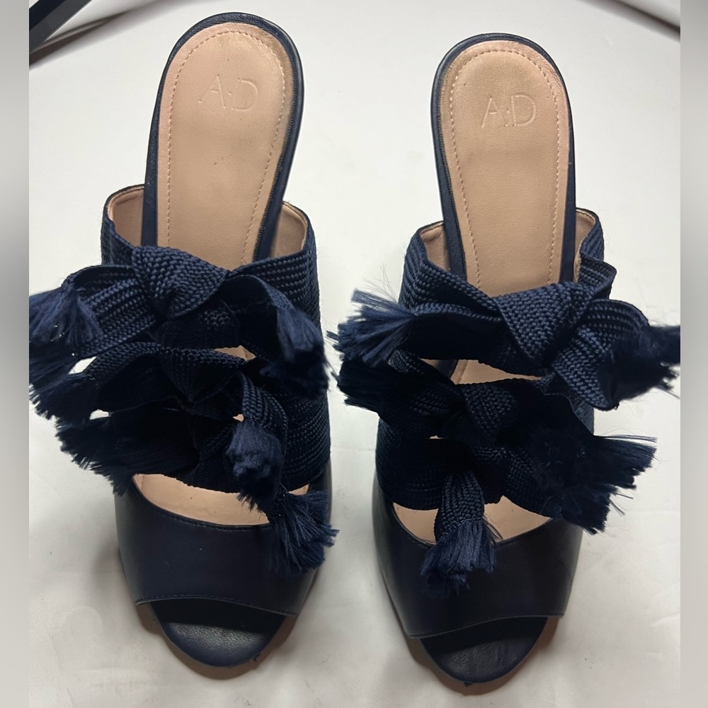AD & Daughters sexy navy bow heels. They have small scuffs by the toe area